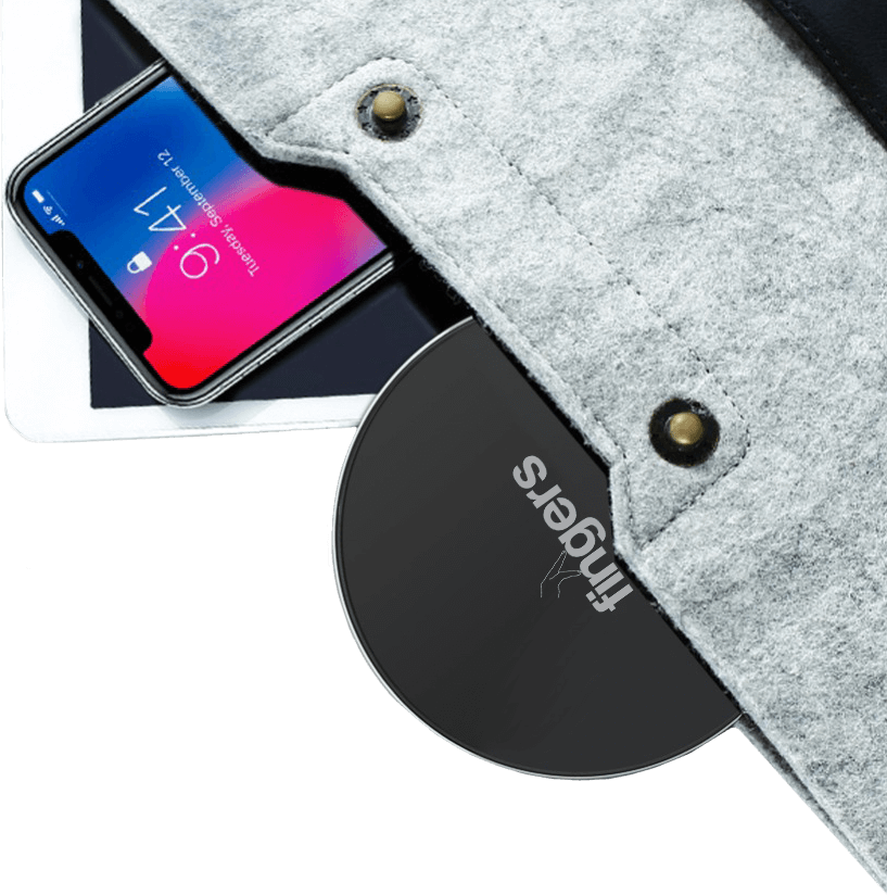FINGERS Wireless Charging Plate and smartphone placed half outside of the laptop sleeve