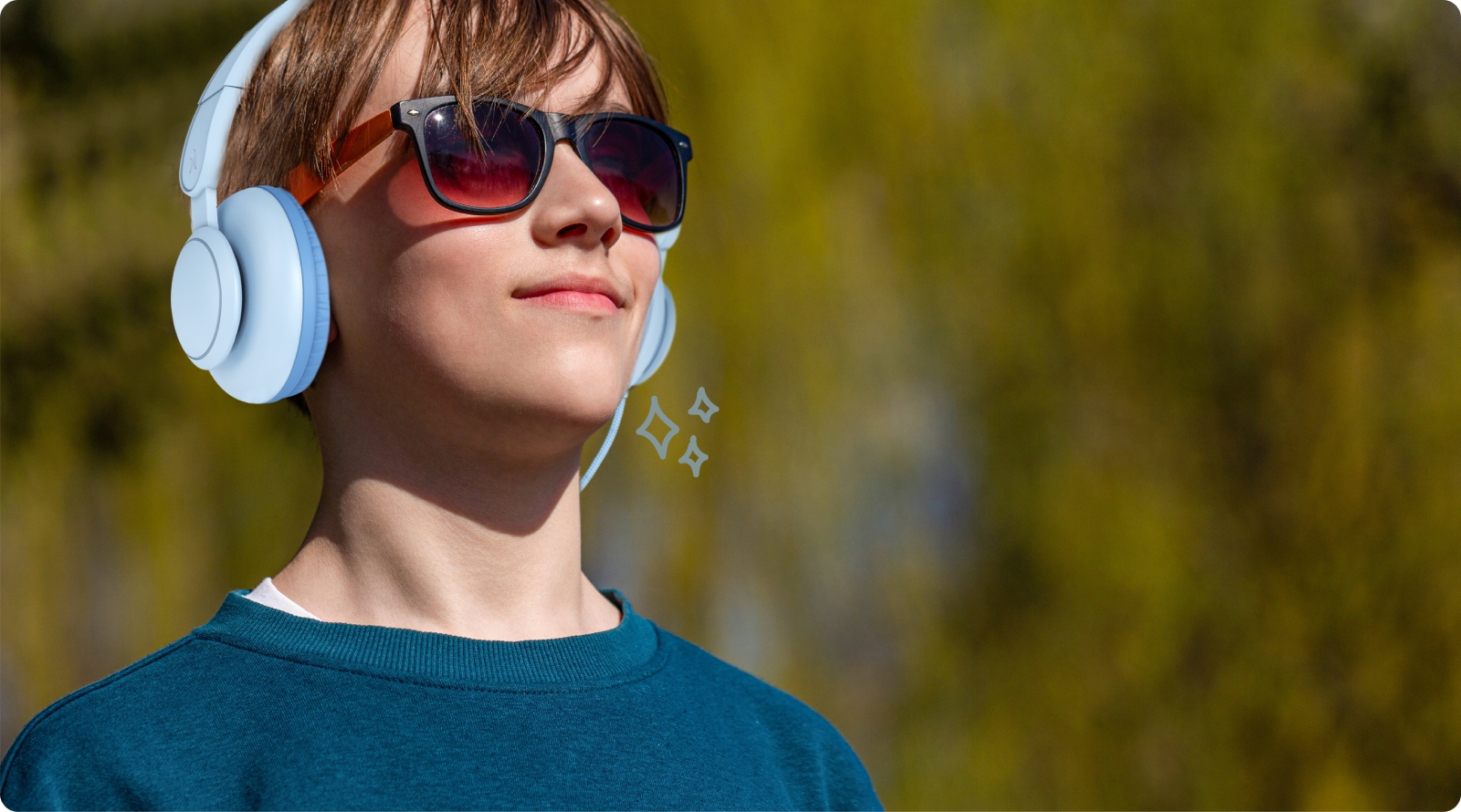 A Young Boy Using FINGERS HappyHertz Comfortable Headset Outdoor