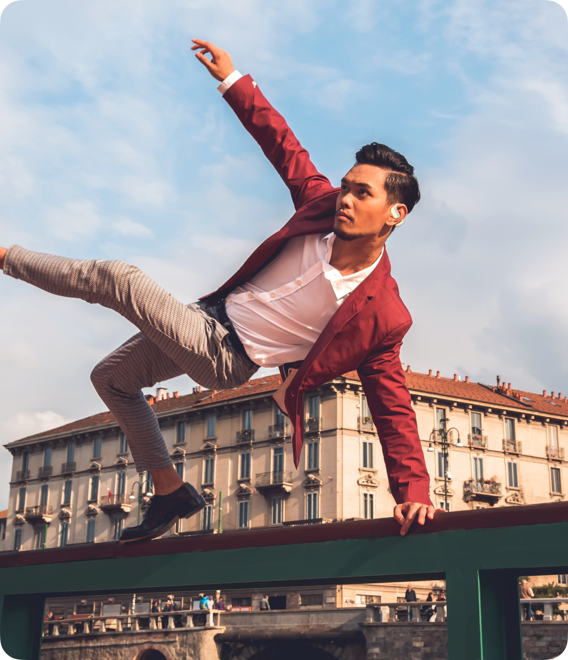 A boy doing action while wearing a FINGERS OWaveS SNC earbuds